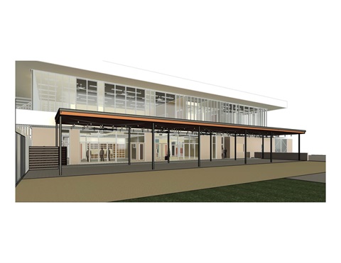 A modern building with large glass windows and an extended roof sits on a grassy area. The structure is sleek with a minimalist design, exuding a contemporary feel.