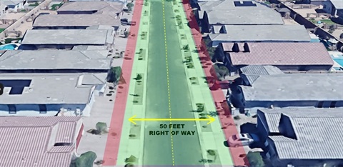 Aerial view of a residential street with a marked 50-foot right of way. Green and red shaded areas highlight the street and surrounding zones. Rectangular houses line both sides.