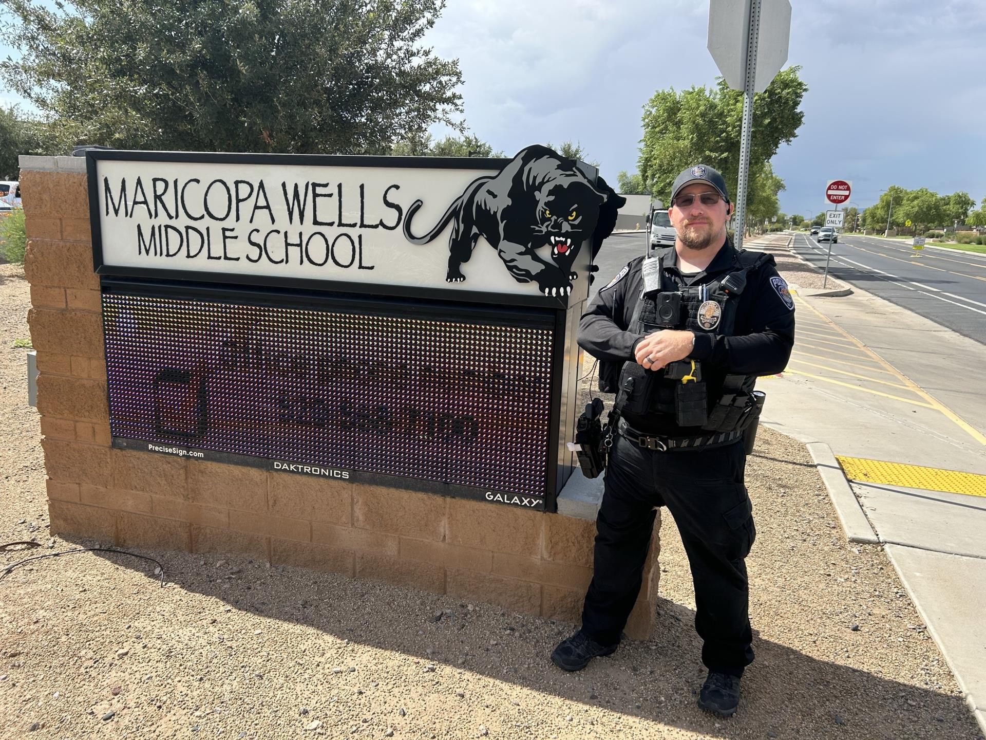 Security officer standing confidently beside the 