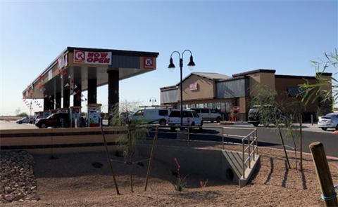 Gas station and convenience store on a sunny day, with 