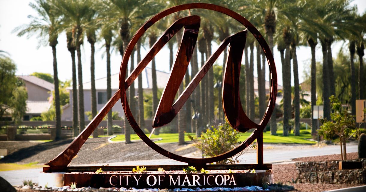 Large metal sculpture with the letter 